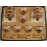 A Royal Worcester cased set of six coffee cups and saucers, decorated with Highland cattle by H