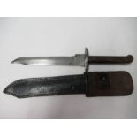 A steel bladed dagger, or knife, with shaped single sided blade, and wooden handle, blade length 7.