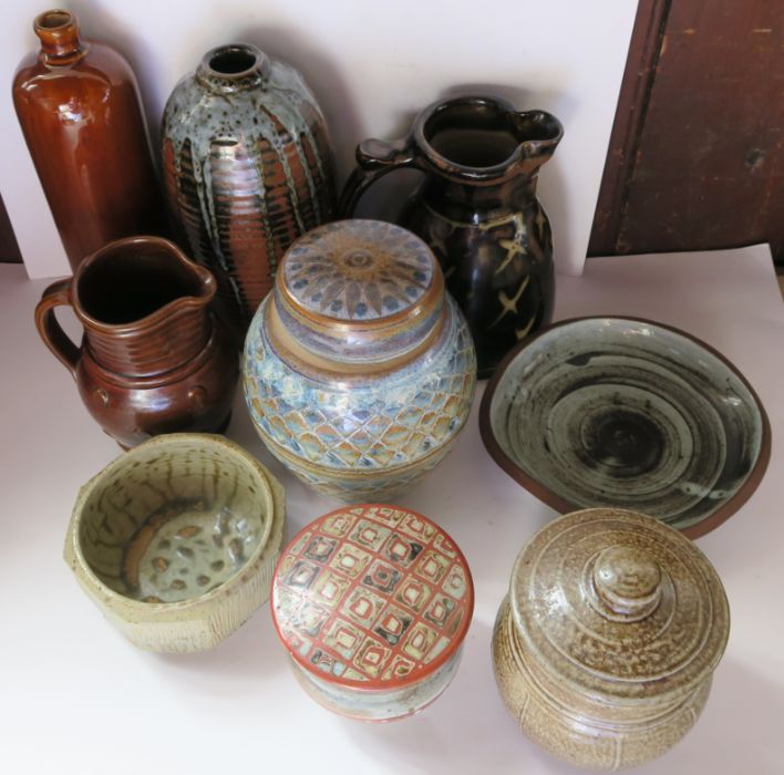Nine studio pottery covered vases, vases, and jugs