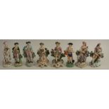 Eight Continental porcelain figures, of men and woman, heights approximately 6ins