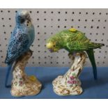 Two Royal Worcester model birds, budgerigars, shape numbers 2663 and 2664 - Green budgie has had