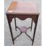 A mahogany occasional table