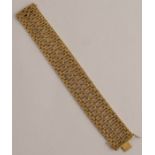 An 18 carat gold bracelet, Birmingham import marks for 1967, 19cm long, 47.8g gross