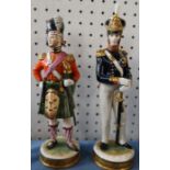 A continental model of a Royal Artillery soldier, together with another soldier in Highland dress (