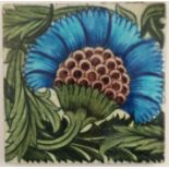 A William de Morgan tile, decorated with a radiating blue flower on a green foliate background, 6.
