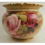 A Royal Worcester jardiniere, decorated all around with roses by R Austin, shape number 1651, height