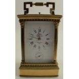 A brass cased repeating carriage clock, the rectangular enamel dial inscribed L Epee, height