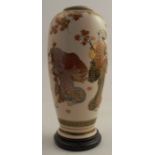 A Japanese Satsuma vase, decorated with figures and foliage, height 7.5ins, together with wooden