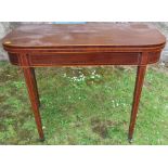 A 19th century mahogany boxwood strung fold over card table, width 36ins