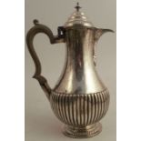 A silver coffee pot, with gadrooned lower body, Sheffield 1904, maker Mappin & Webb, weight 13oz all