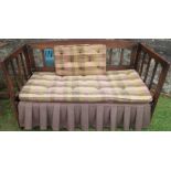 An oak day bed, with gallery sides, 60ins x 29ins, height 32ins