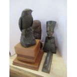 A resin model of a bird, signed Dulk, a bust model of Nefertiti, tribal bust and a model of