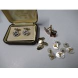 A collection of cuff links, to include Guinness examples, silver Maltese cross examples, two pairs