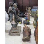 A collection of Antique wooden religious and other figures, including saints, Jesus and possibly