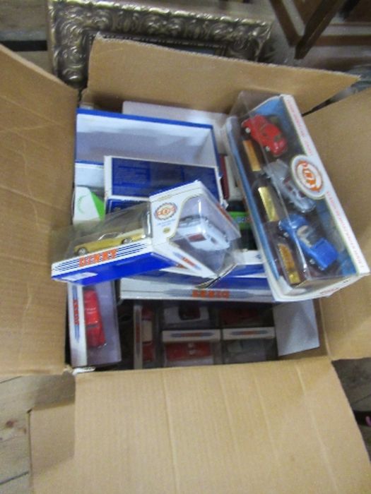 A collection of boxed Dinky Matchbox, Corgi and other model toys, including racing cars, to