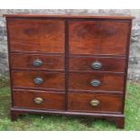 A 19th century mahogany dwarf cupboard, having two cupboard doors opening to reveal a shelf, with