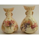 Two Royal Worcester blush ivory quarter lobbed coral jugs, decorated with flowers, shape number