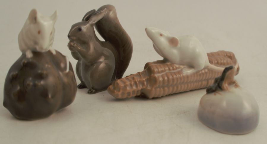 Four Copenhagen porcelain animals, a squirrel, two mice and a frog