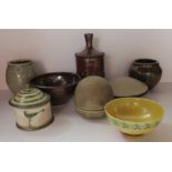 A small Ruskin yellow bowl, together with 8 small studio pottery vases, covered vases, and dishes