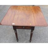 A mahogany pembroke table, fitted with one real and one dummy end drawer