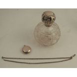 A glass and hallmarked silver dressing table scent bottle, af, together with a silver sovereign case