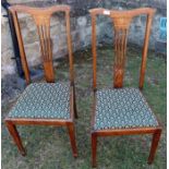 A pair of dining chairs, wit inlaid decoration