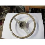 A wood and aluminium steering wheel, diameter 14ins