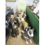A collection of resin models of dogs, to include Border Fine Arts Rottweiler, Frith cat model, etc.