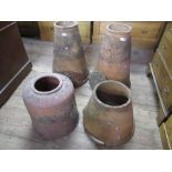 Four terracotta rhubarb pots. Heights 25ins, 17ins, 15ins.