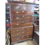 A late Georgian mahogany chest on chest, the top section fitted two short drawers over three