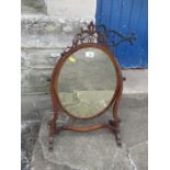 An Edwardian swing frame toilet mirror, mirror dimensions width 12ins, height 16ins