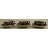 Three 18th century Worcester teacups and saucers, the scale blue ground decorated reserve panels