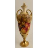 A Royal Worcester covered pedestal vase, decorated to the front with fruit to a mossy background