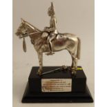 A military silver model, of a soldier mounted on a horse, with presentation plaque from the 5th