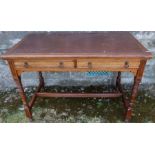 An Edwardian Gillow & Co mahogany desk, with leather inset top, fitted with two frieze drawers,