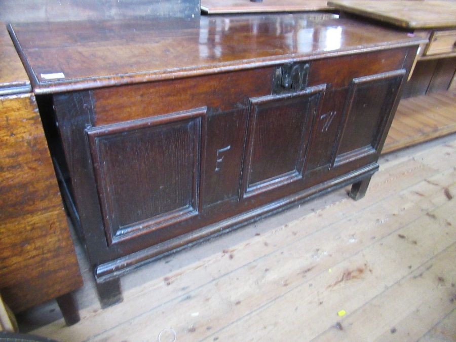 An Antique oak coffer, width 50ins, depth 21.5ins, height 29ins