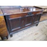 An Antique oak coffer, width 50ins, depth 21.5ins, height 29ins