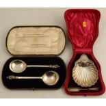A cased pair of Elkington & Co Apostle serving spoons, Birmingham 1906, together with a cased