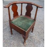 A Georgian mahogany corner chair