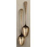 Two Georgian silver basting spoons, one engraved with a crest the other initials, London 1787 and