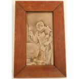 A brown glazed pottery tile, embossed with a monk and ale barrel, 11.5ins x 6ins, framed