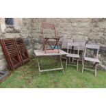 A collection of garden furniture, to include folding table and six chairs, nine other folding