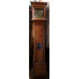 An antique seaweed marquetry long case clock, the square bras dial inscribed Walter Morgan Hereford,