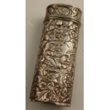 A 19th century silver spectacles case, of oval form, embossed with figures, flowers and scrolls,