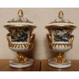 A pair of campana shaped covered urns, decorated with landscape and gilded to a white ground,