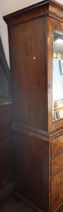 An antique walnut cabinet on chest, the upper section fitted with a pair of mirrored doors, - Image 3 of 4