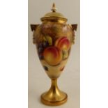 A Royal Worcester covered pedestal vase, decorated all around with fruit to a mossy background by