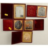 Four daguerreotypes, two of children , one of a man in army uniform and the other of a gentleman,