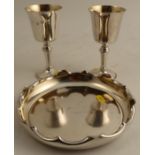 A pair of silver goblets, Birmingham 1972, weight 10oz, together with a circular silver plated dish,