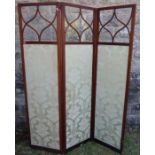 A 19th century mahogany framed three fold screen, the upper section glazed, with upholstered section